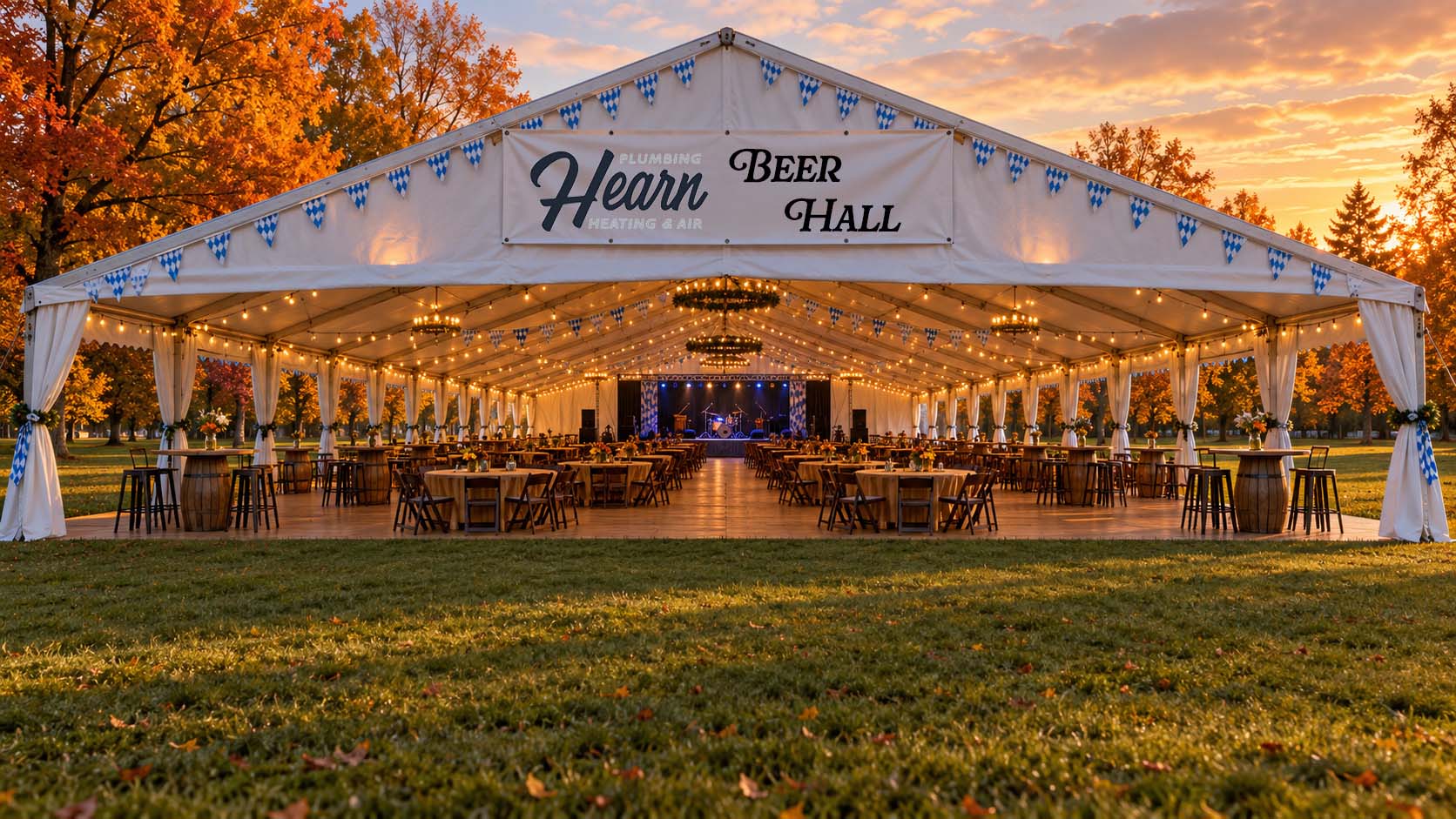 The Madison Oktoberfest Beer Hall Tent, set with tables, with the Hearn Plumbing, Heating & Air logo on the front